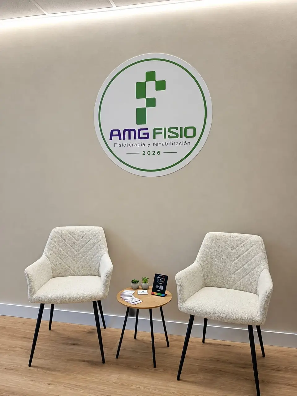 Waiting-room chairs under the AMG Fisio logo