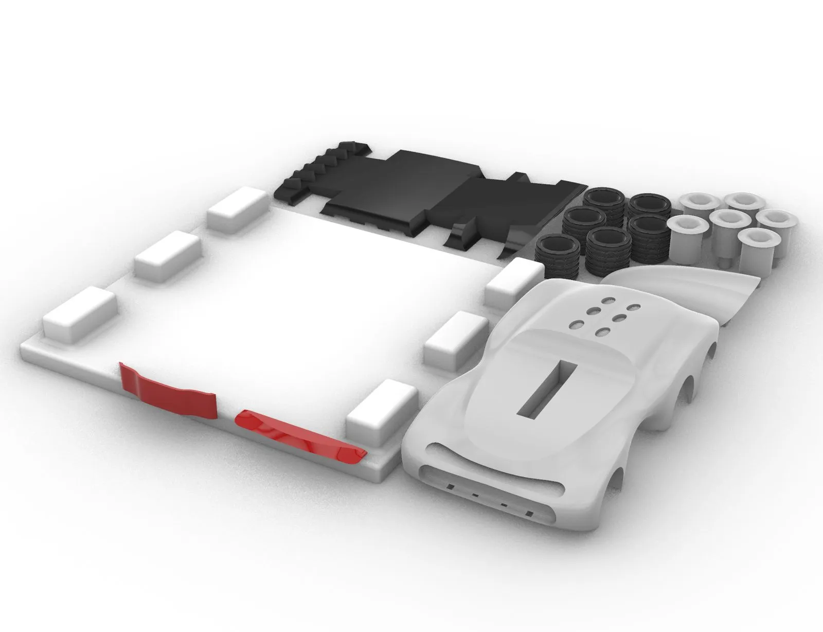 Rhino part-kit layout: base plate with raised blocks, black chassis parts, six tyres, six rim hubs and white body shell